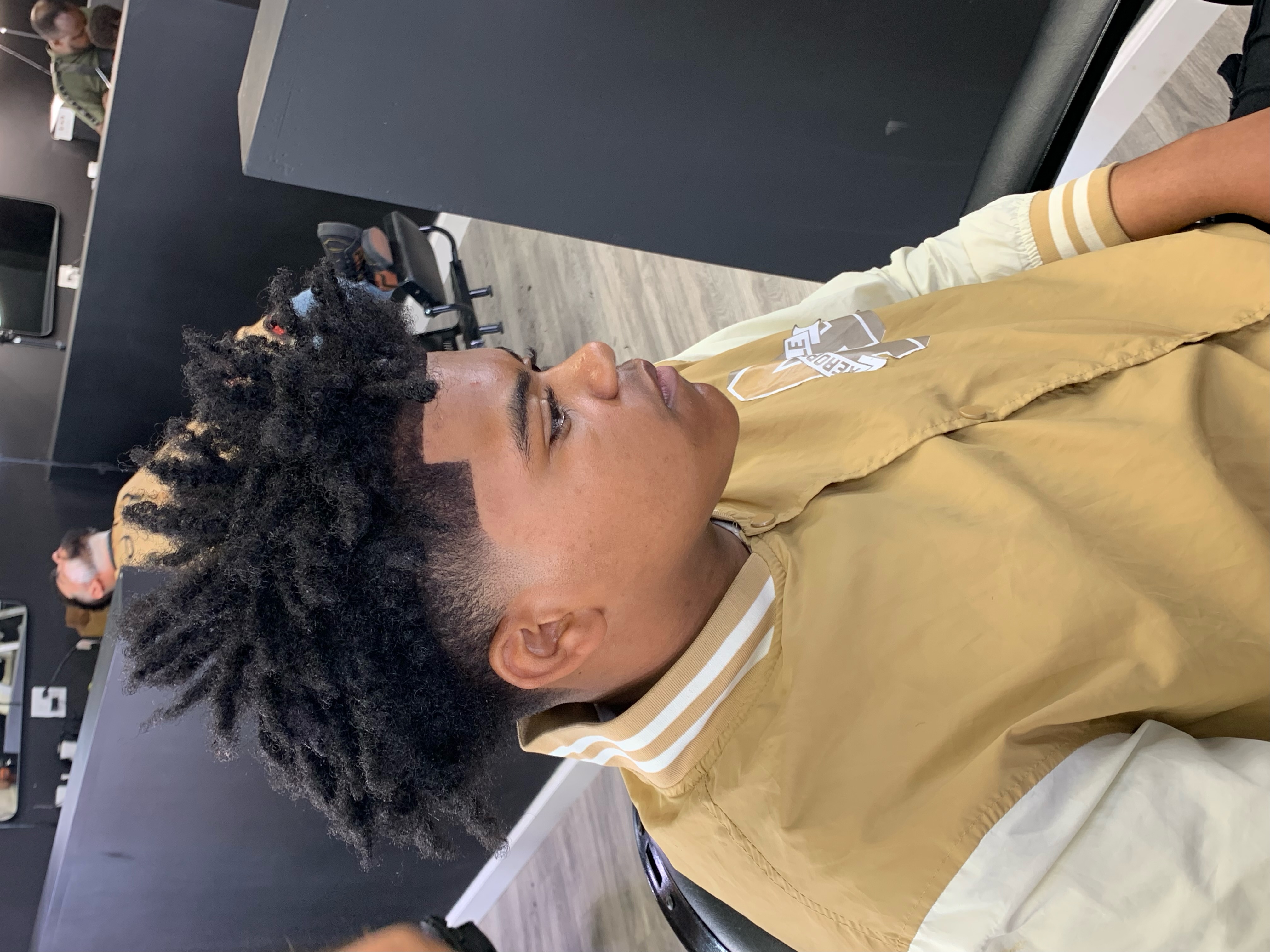 Curly top with precision fade